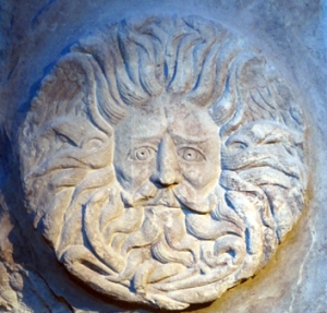 The stone fascia of the Roman-British shrine of 'Minerva Aquae Sulis' at Bath displayed this magnificent head of 'Manannan'. Note the 'solar' rays of the hair and the 'watery' appearance of the beard...